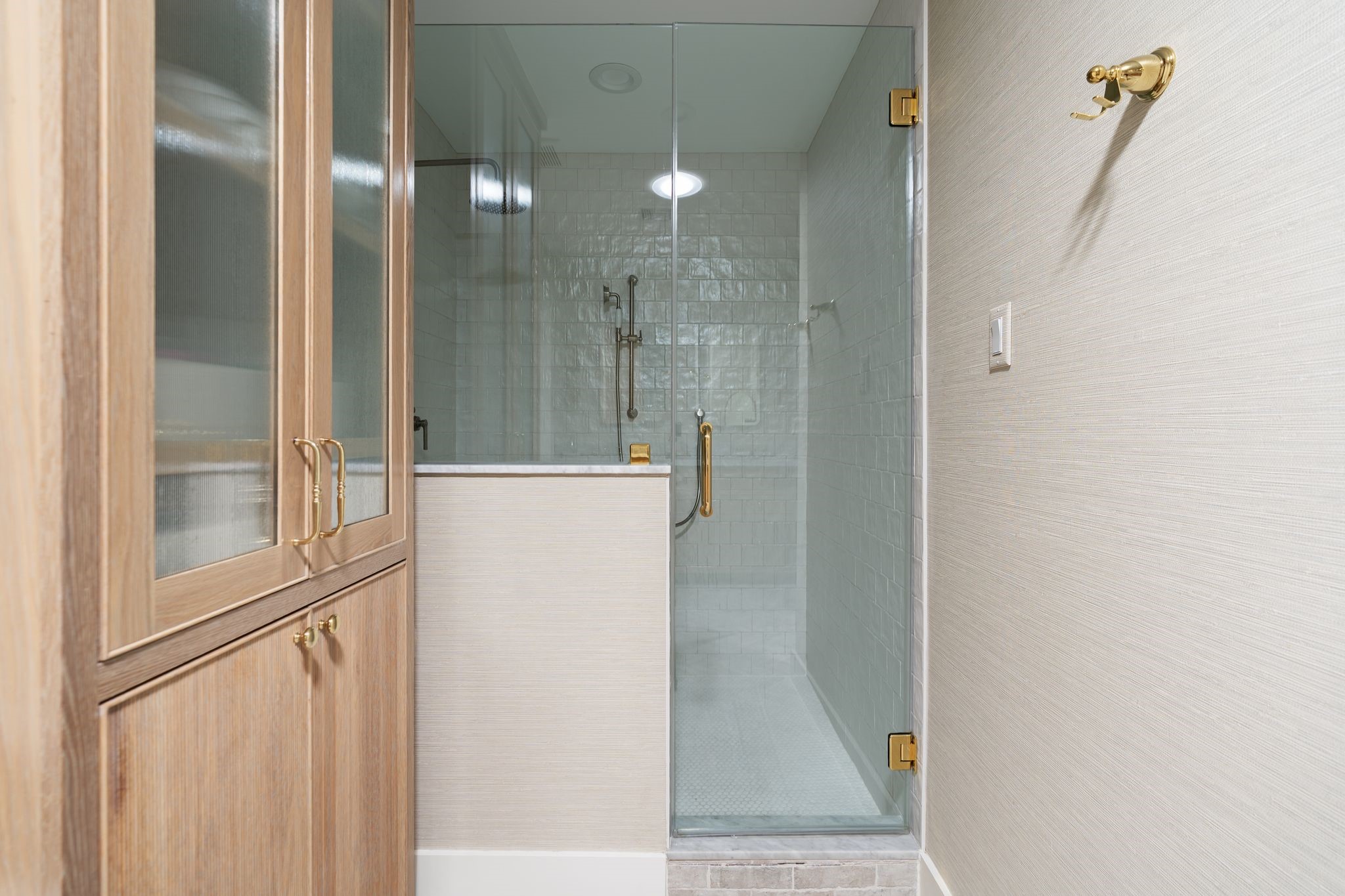 4902 Candleleaf Drive Houston, TX 77018 - Photo 19 of 32 A spacious walk-in shower with glass enclosure creates a clean, spa-like focal point.