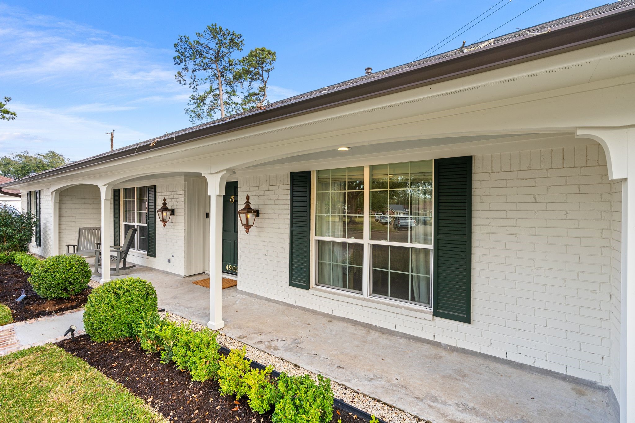 4902 Candleleaf Drive Houston, TX 77018 - Photo 28 of 32 The generous front yard and welcoming entry with a covered front porch create a timeless first impression.