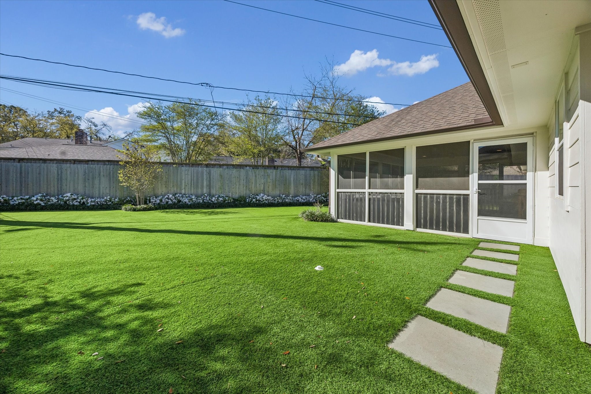 4902 Candleleaf Drive Houston, TX 77018 - Photo 30 of 32 The private backyard offers space to gather, play, or simply unwind.