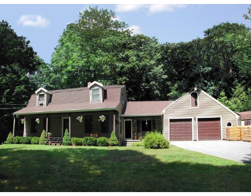 30 Old Wales Road Monson, MA 01057 - Photo 1 of 15 a front view of a house with a yard