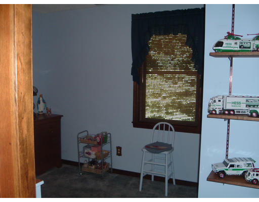30 Old Wales Road Monson, MA 01057 - Photo 11 of 15 a picture of table and chair in the room