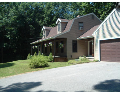 30 Old Wales Road Monson, MA 01057 - Photo 2 of 15 a front view of a house with garden