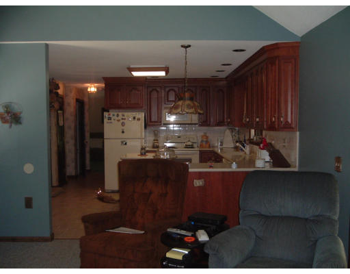 30 Old Wales Road Monson, MA 01057 - Photo 5 of 15 a kitchen with refrigerator and cabinets