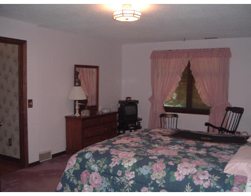 30 Old Wales Road Monson, MA 01057 - Photo 9 of 15 a bedroom with a bed and a dresser