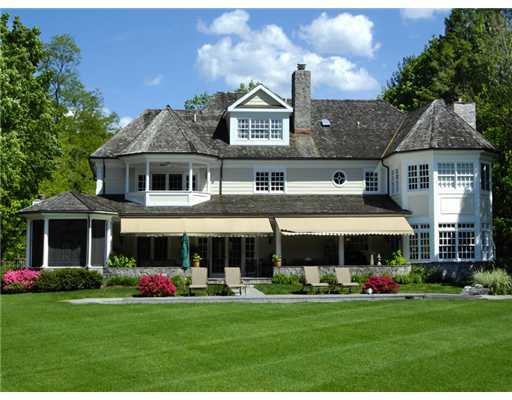 154 Stanwich Road Greenwich, CT 06830 - Photo 13 of 13 a front view of a house with a yard