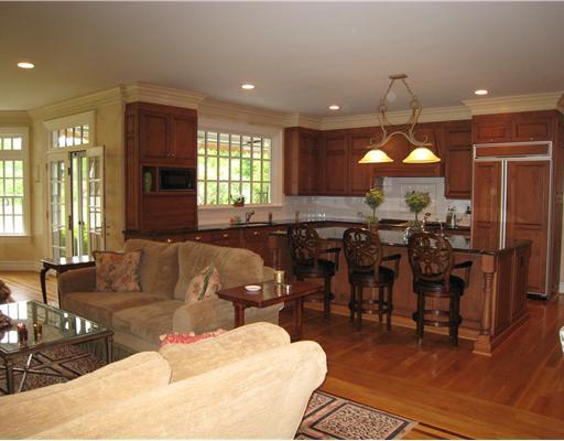 154 Stanwich Road Greenwich, CT 06830 - Photo 5 of 13 a living room with lots of furniture and a chandelier