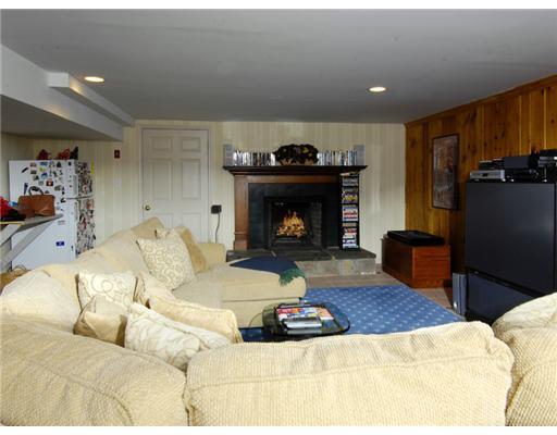 154 Stanwich Road Greenwich, CT 06830 - Photo 7 of 13 a living room with furniture and a fireplace