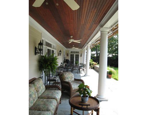 154 Stanwich Road Greenwich, CT 06830 - Photo 8 of 13 a living room with furniture and a large window
