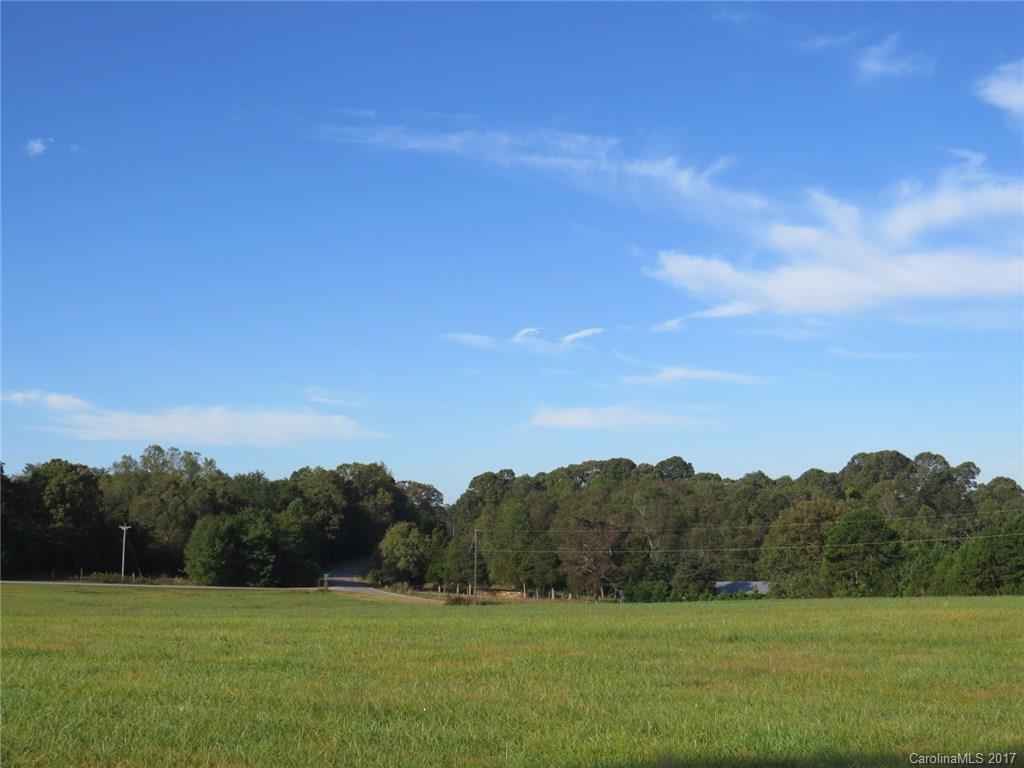 0 Antietam Road Stony Point, NC 28678 - Photo 17 of 24 a view of a grassy field with trees in the background