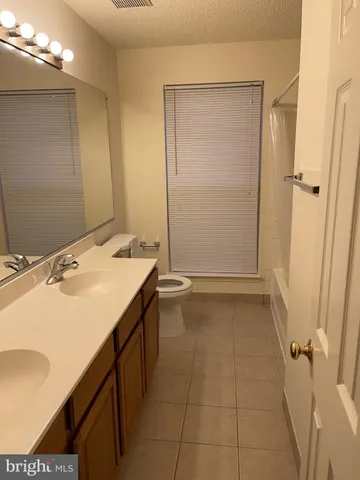 a view of a hallway with staircase