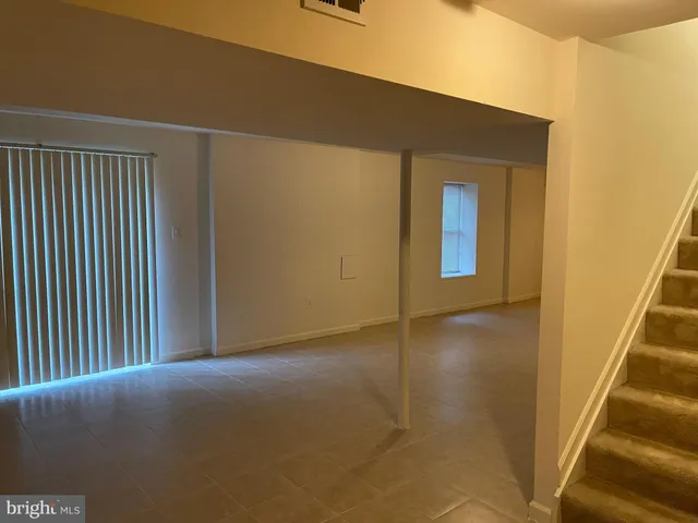 a view of outdoor space with trees all around