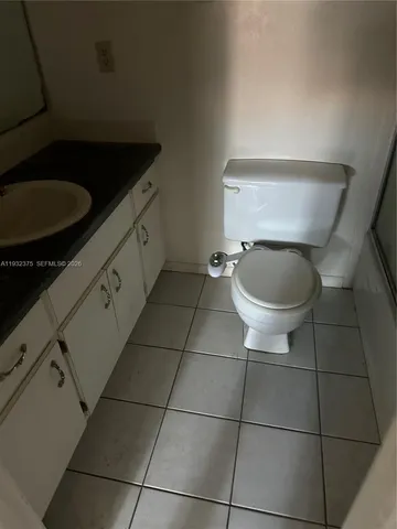 a close view of a sink and a mirror