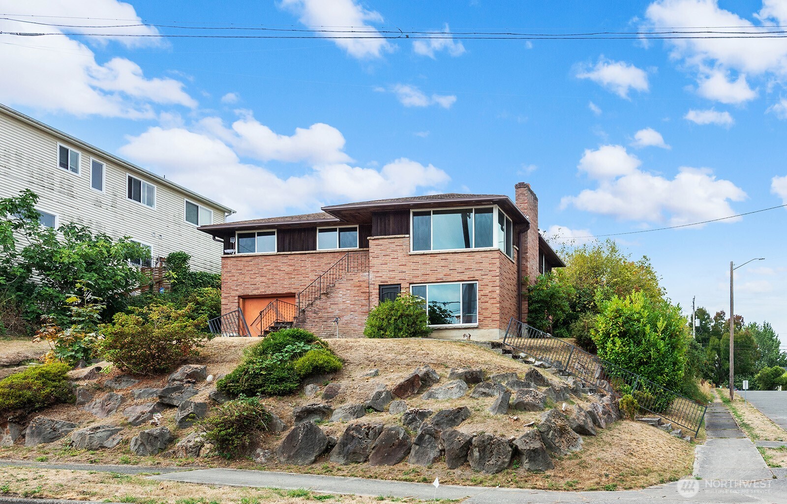 2601 23rd Avenue South Seattle, WA 98144 - Photo 1 of 13 a front view of a house with garden