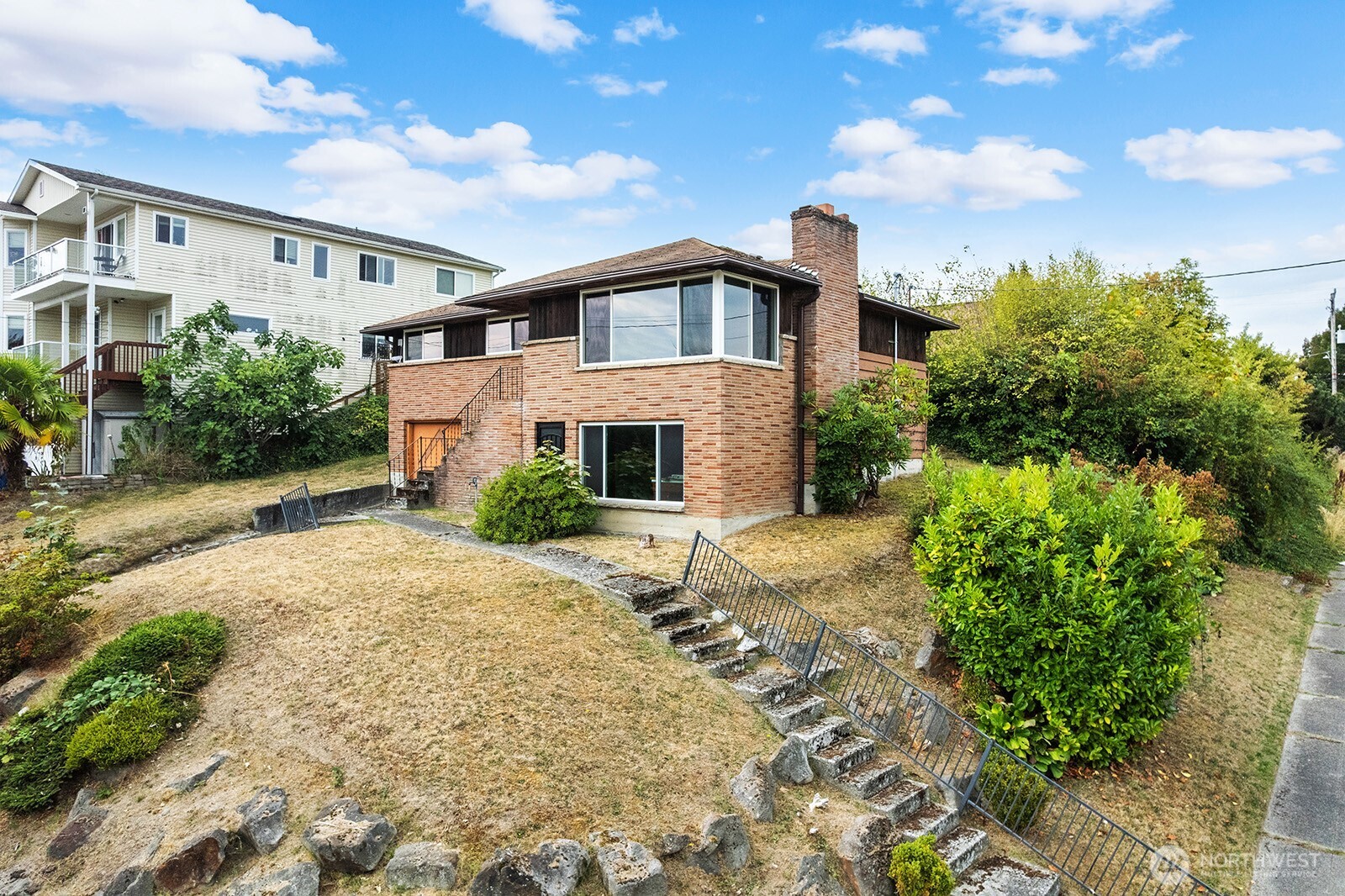 2601 23rd Avenue South Seattle, WA 98144 - Photo 2 of 13 a house view with a garden space