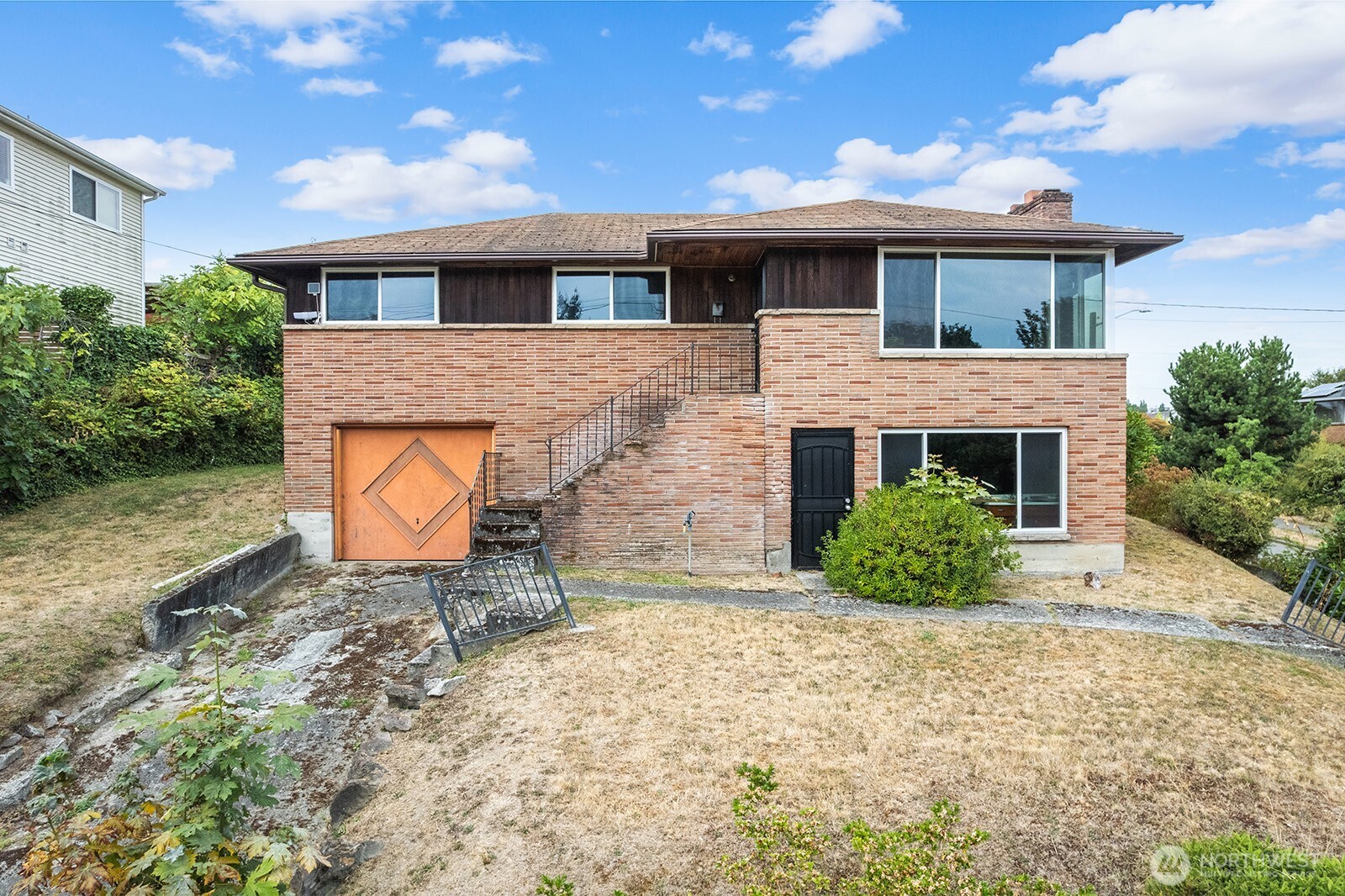 2601 23rd Avenue South Seattle, WA 98144 - Photo 3 of 13 a front view of a house with a yard