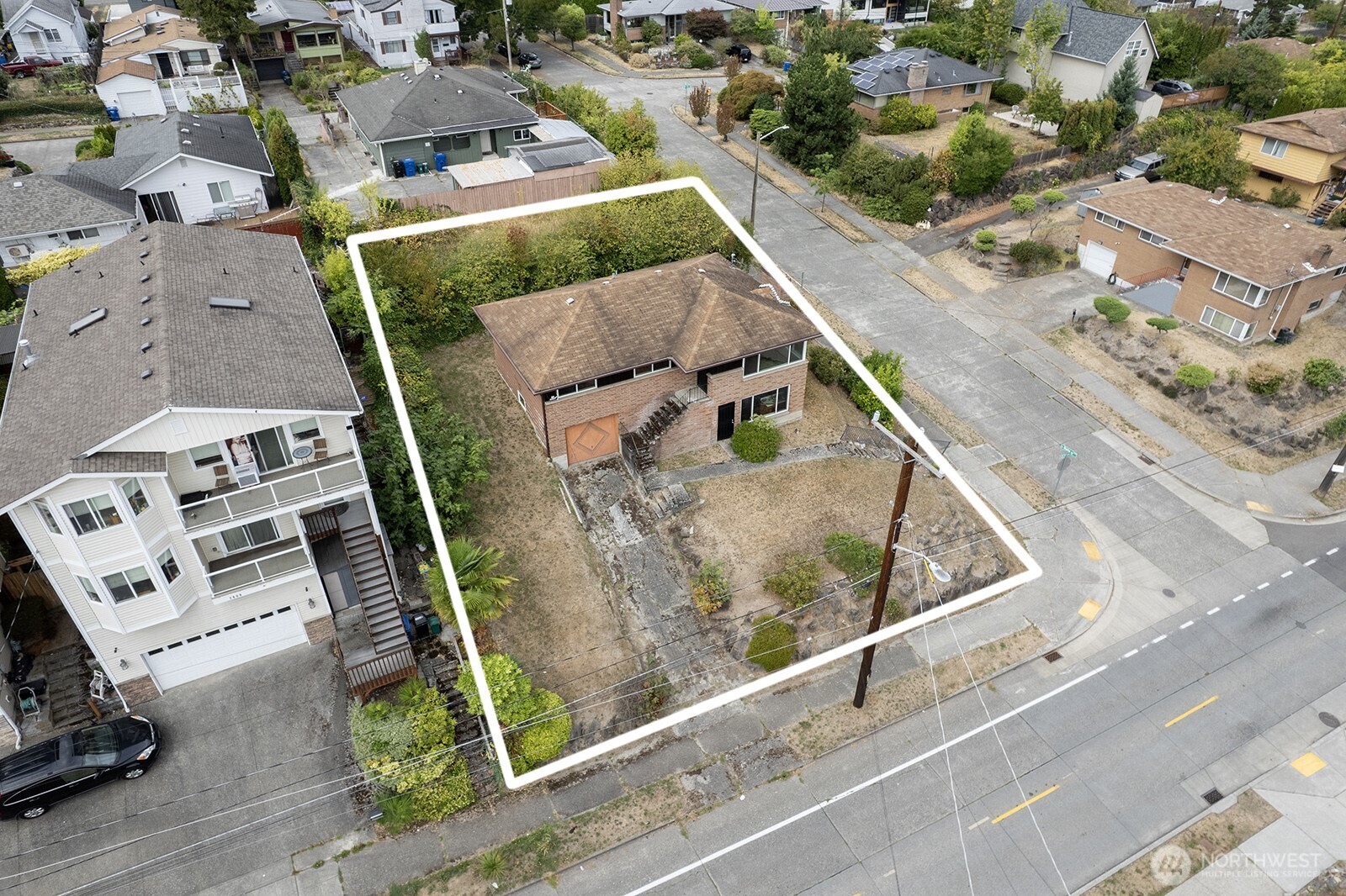 2601 23rd Avenue South Seattle, WA 98144 - Photo 8 of 13 an aerial view of a residential houses with outdoor space