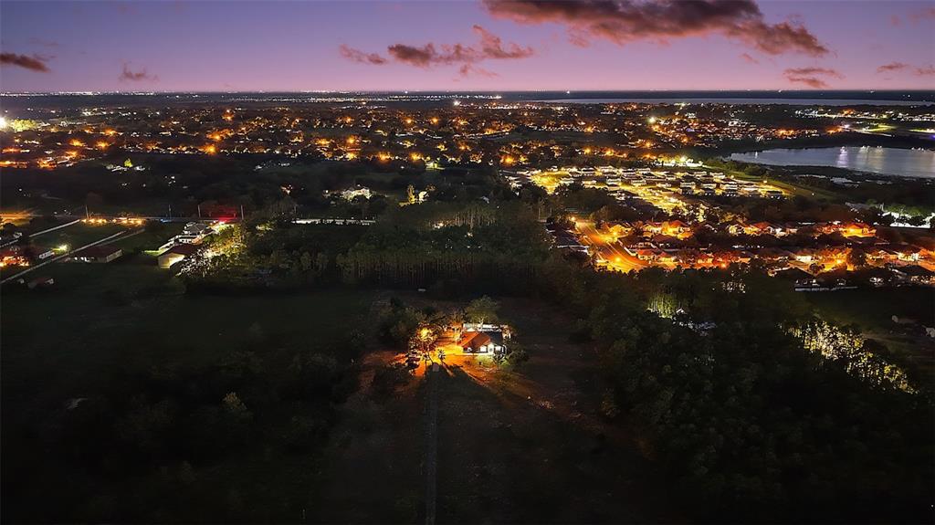 14520 Lost Lake Road Clermont, FL 34711 - Photo 24 of 54 a sunset view with lake