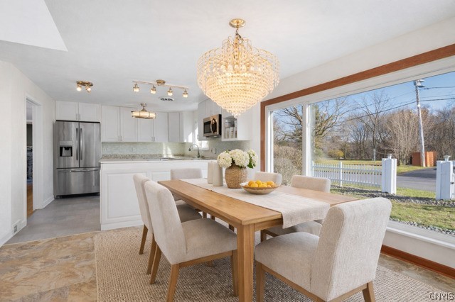 101 Andrews Road DeWitt, NY 13214 - Photo 16 of 50 Virtually staged dining room