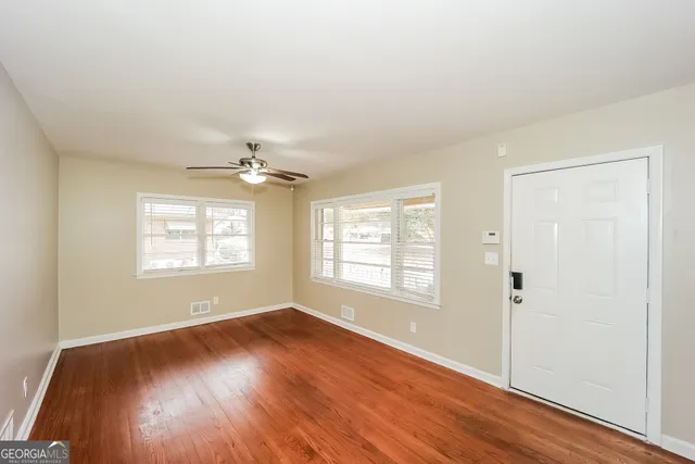 an empty room with windows