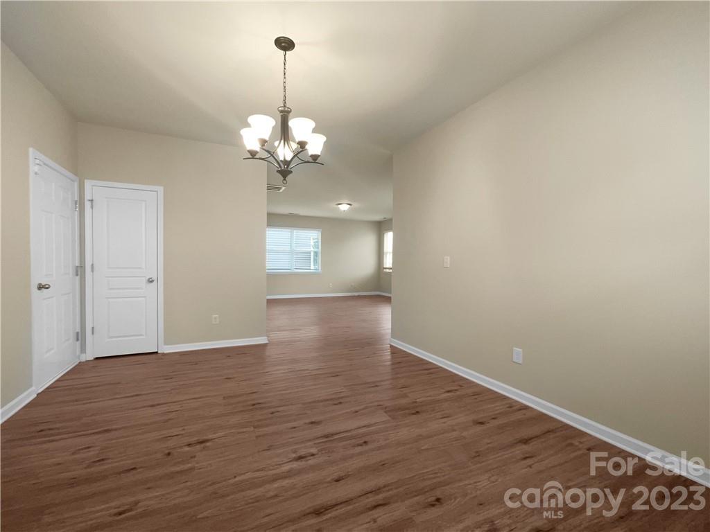 10775 Traders Court Davidson, NC 28036 - Photo 13 of 28 a view of a chandelier in a room