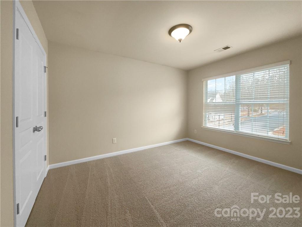10775 Traders Court Davidson, NC 28036 - Photo 20 of 28 a view of an empty room with a window