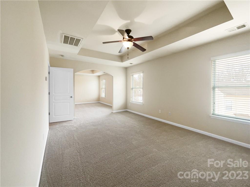 10775 Traders Court Davidson, NC 28036 - Photo 22 of 28 a view of an empty room with a window