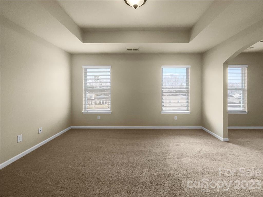 10775 Traders Court Davidson, NC 28036 - Photo 24 of 28 an empty room with a window