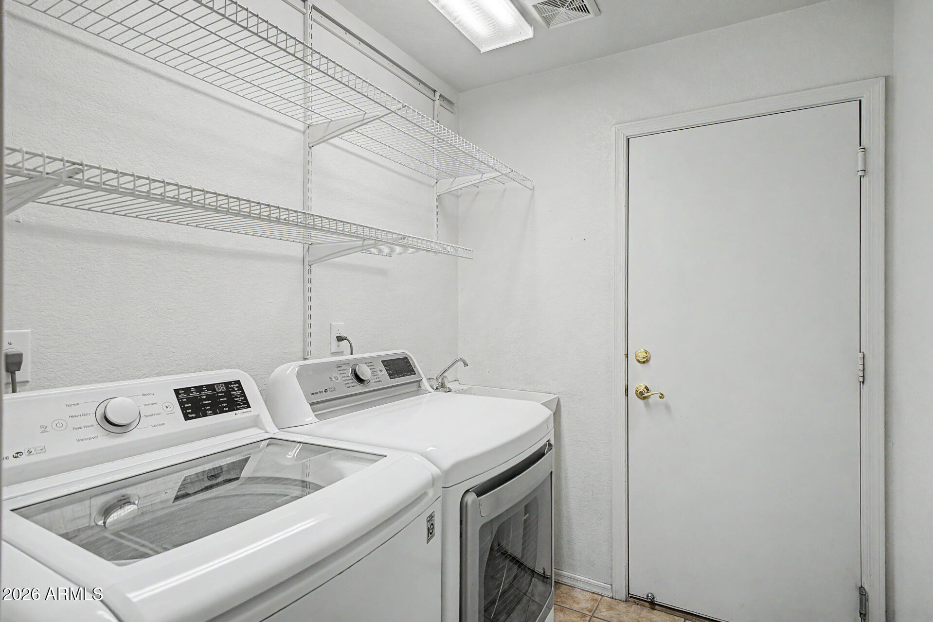 4123 West Alex Loop Phoenix, AZ 85083 - Photo 27 of 38 Laundry Room with Sink