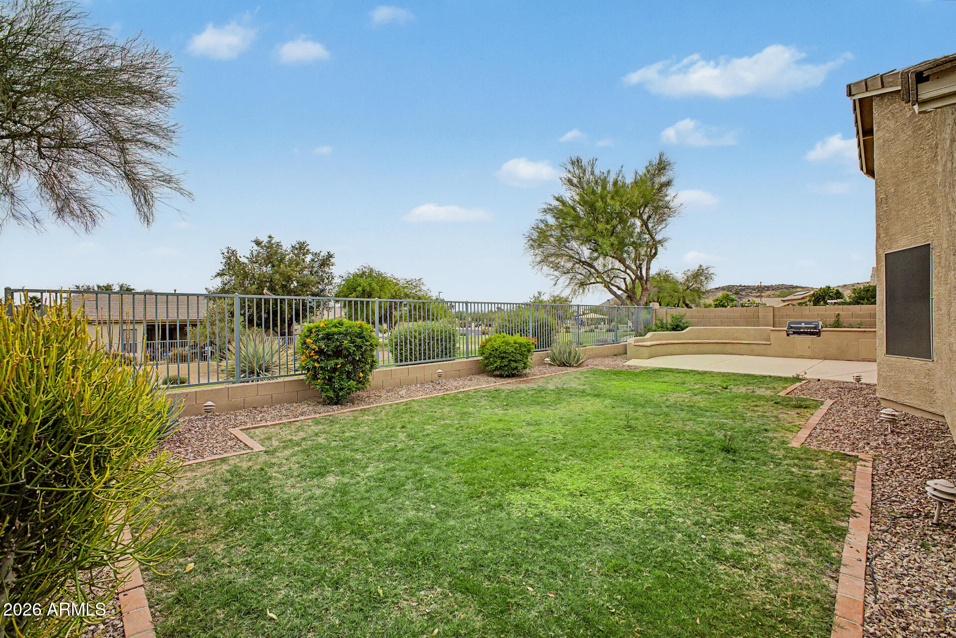4123 West Alex Loop Phoenix, AZ 85083 - Photo 32 of 38 View Fencing to Common Area