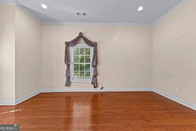 a bathroom with a sink a mirror and a vanity