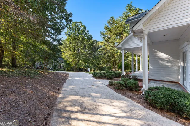 a house with trees in front of it