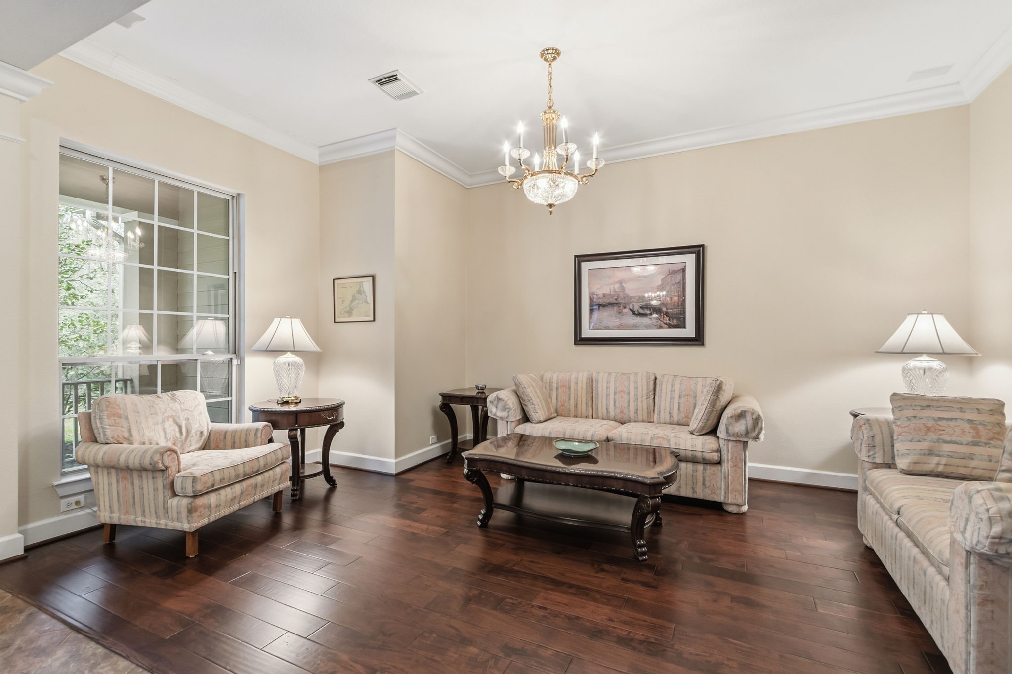 7514 Saddle Blanket Drive Waller, TX 77484 - Photo 8 of 50 The large formal living room is another place to have long conversations with your guests. The chandelier is excluded from the sale.