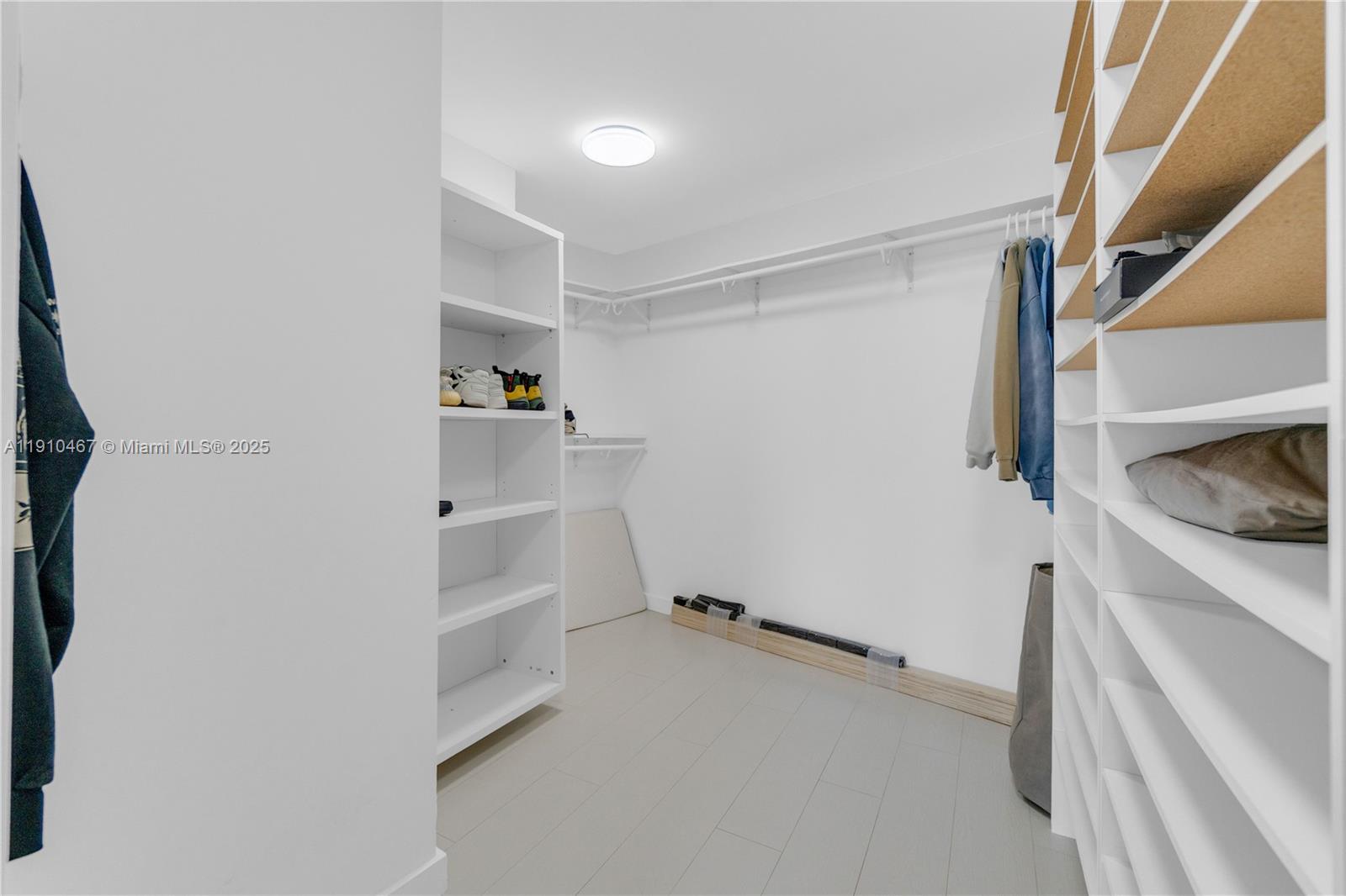 200 Biscayne Blvd Way, Unit 3907 Miami, FL 33131 - Photo 29 of 46 a view of storage and utility room with empty racks