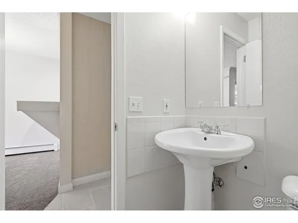 a view of a building with sitting area