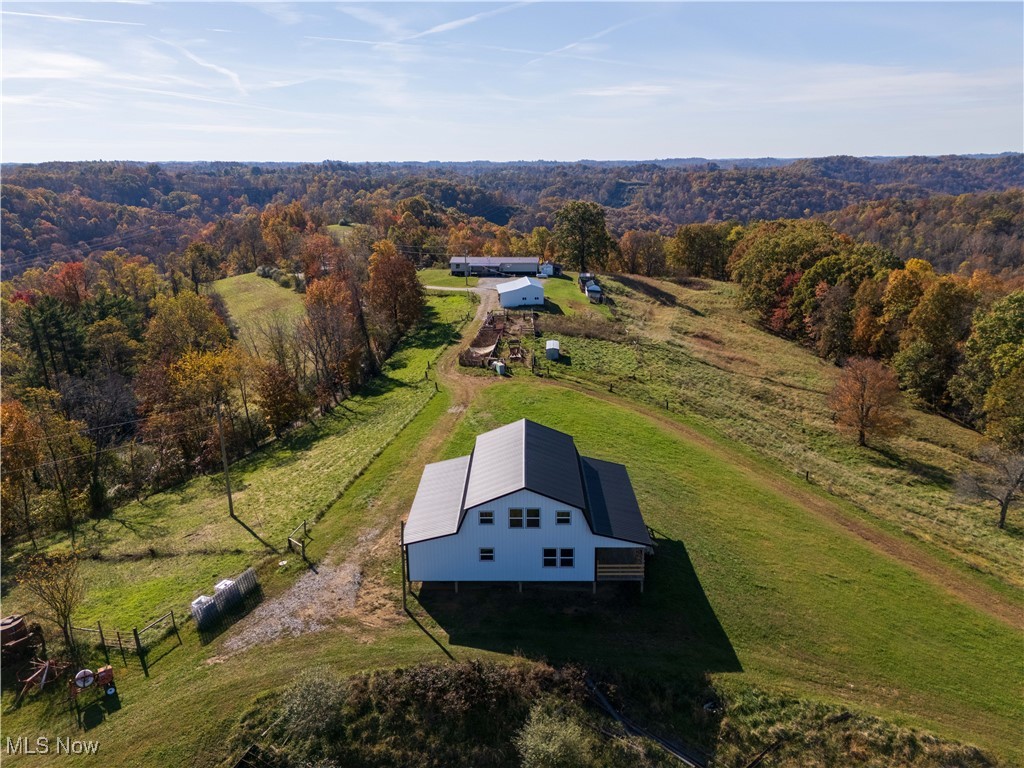540 Wine Road Elizabeth, WV 26143 - Photo 43 of 49 View of rural area with a heavily wooded area