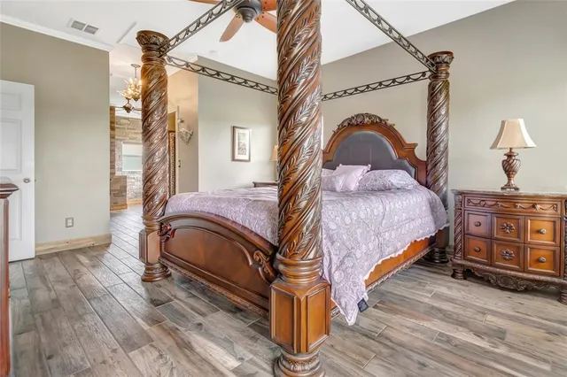 a white toilet sitting next to a white wall