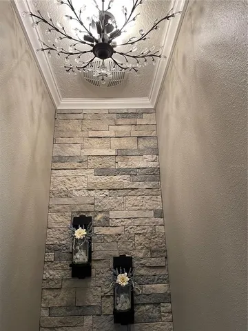 a view of a field with an trees in the background