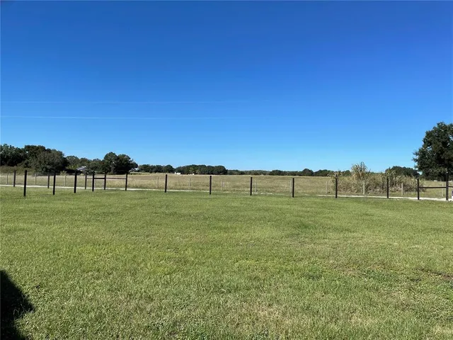 a view of an ocean from a yard