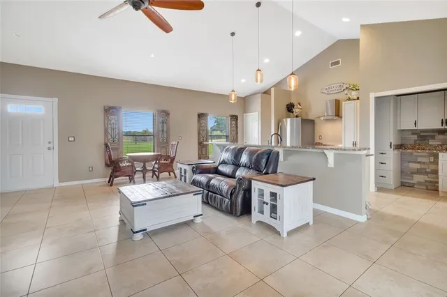 a living room with furniture and a window