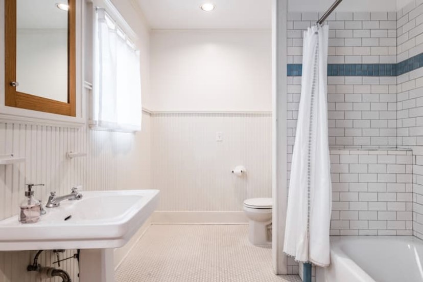 609 West Mary Street Austin, TX 78704 - Photo 11 of 21 a bathroom with a sink a toilet and shower