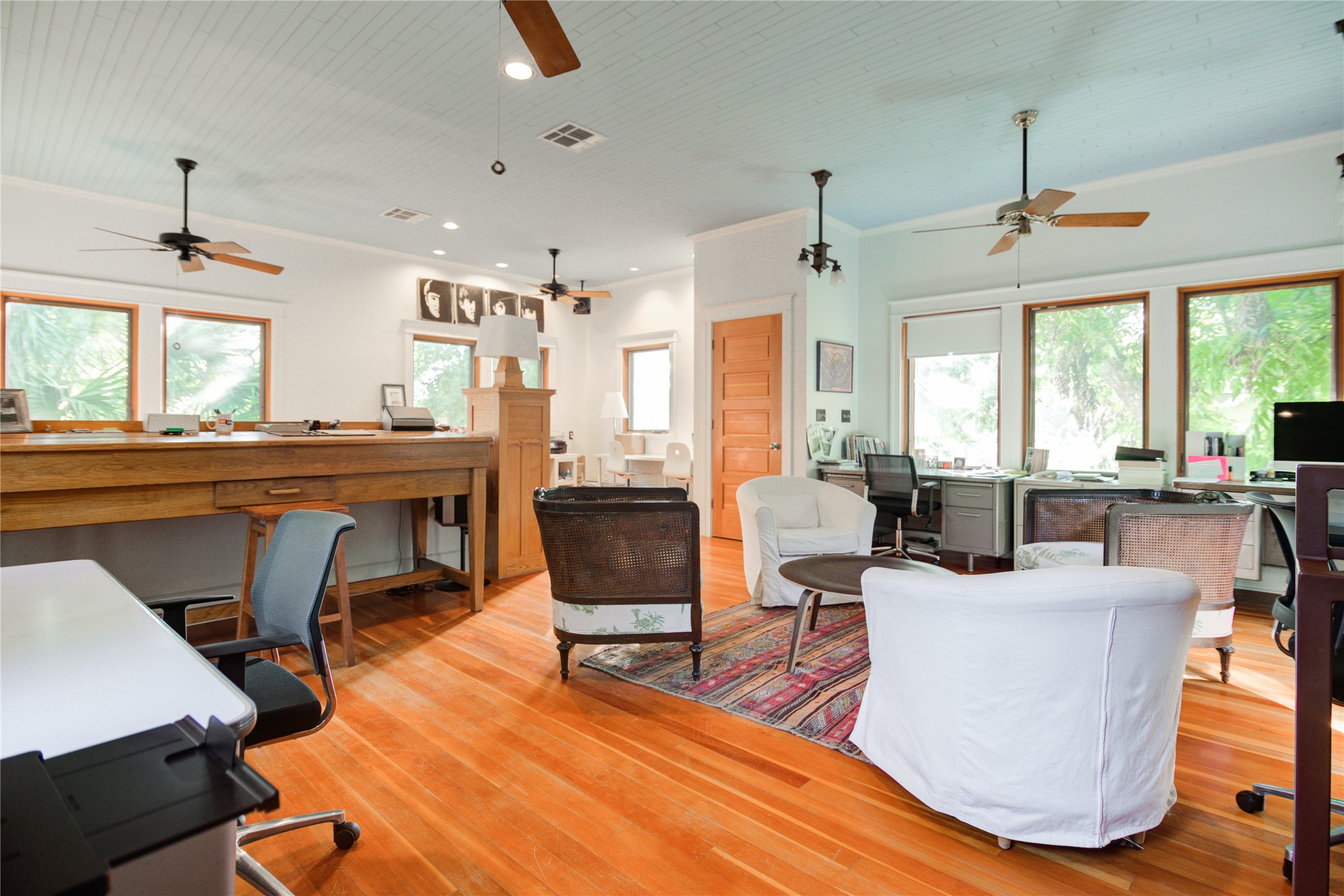 609 West Mary Street Austin, TX 78704 - Photo 16 of 21 a living room with furniture a large window and wooden floor