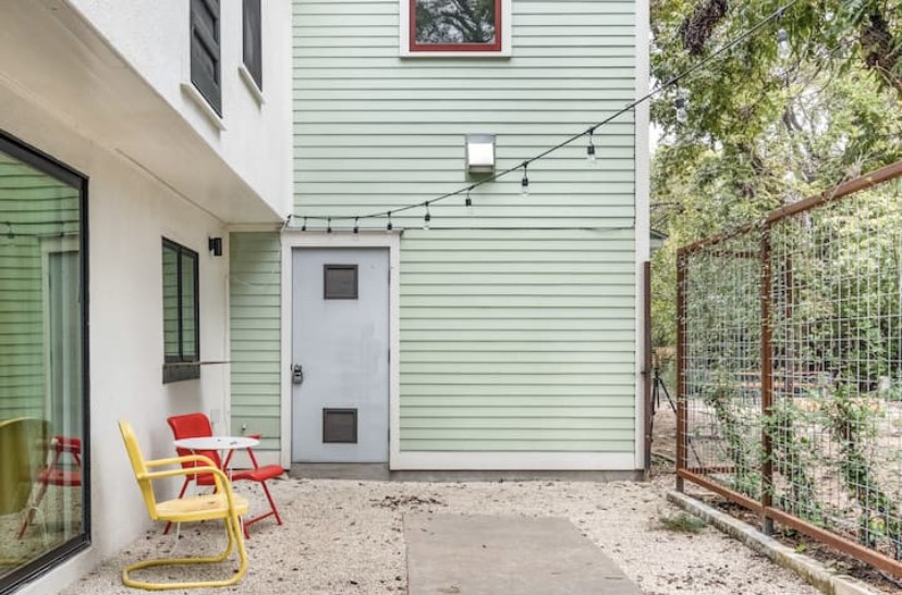 609 West Mary Street Austin, TX 78704 - Photo 21 of 21 a backyard of a house with outdoor seating