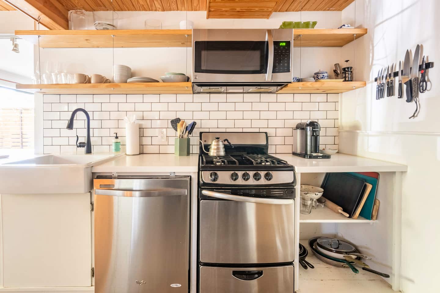 609 West Mary Street Austin, TX 78704 - Photo 7 of 21 a kitchen with a stove and a microwave