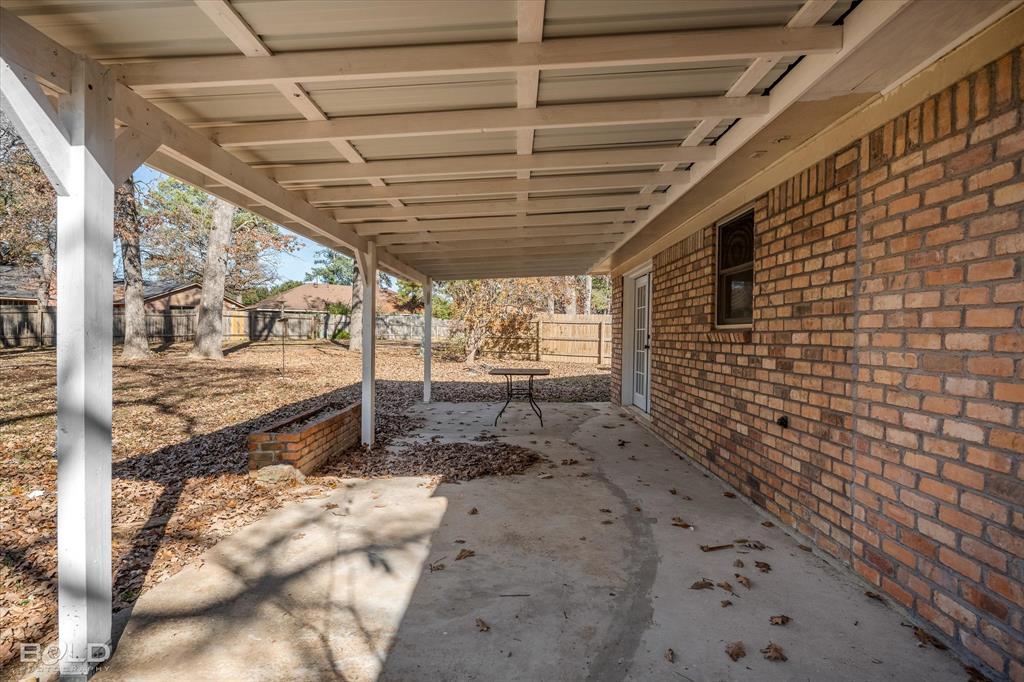 6016 Fox Ridge Shreveport, LA 71129 - Photo 11 of 33 a view of a backyard of a house