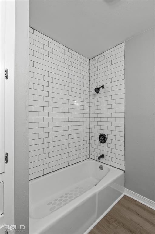 6016 Fox Ridge Shreveport, LA 71129 - Photo 31 of 33 a bathroom with a bathtub and shower