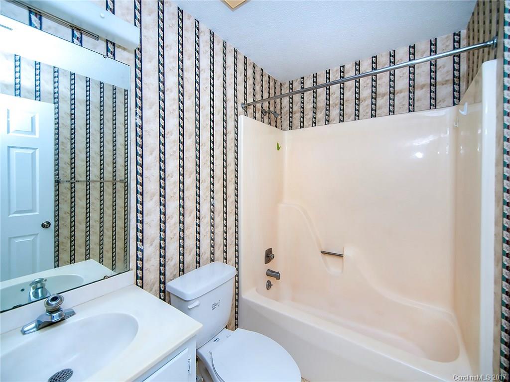 740 Rama Road Charlotte, NC 28211 - Photo 13 of 15 a bathroom with a sink toilet and shower