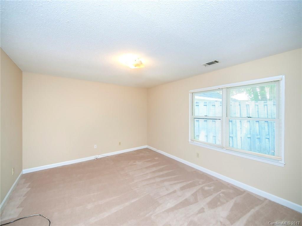 740 Rama Road Charlotte, NC 28211 - Photo 14 of 15 an empty room with a window