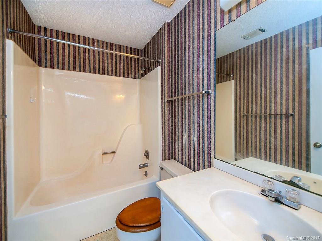 740 Rama Road Charlotte, NC 28211 - Photo 15 of 15 a bathroom with a sink and a bathtub