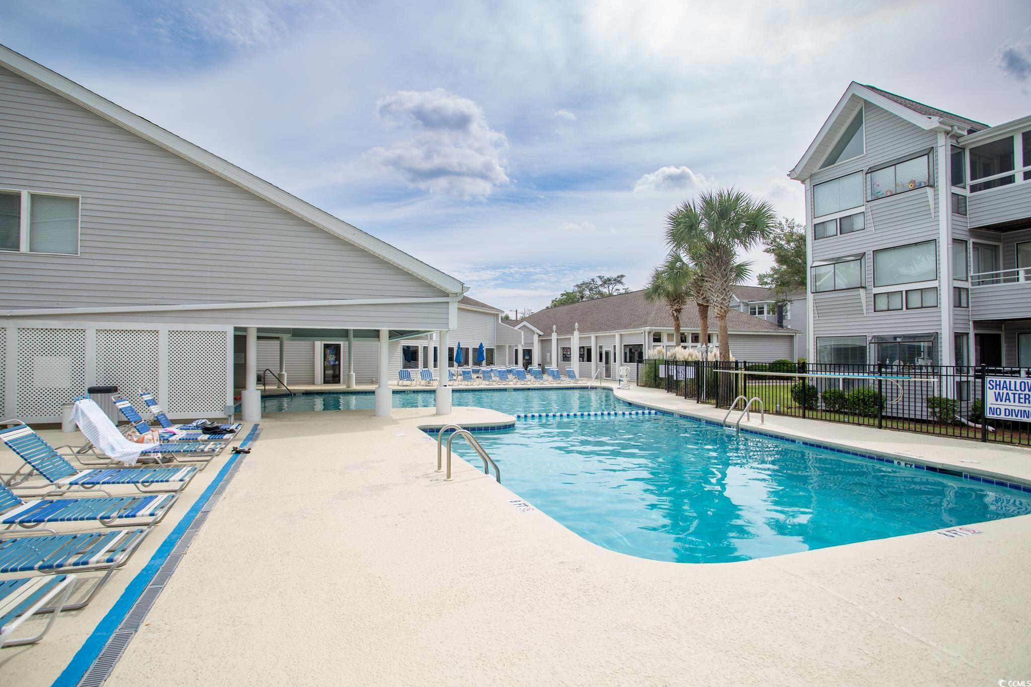 351 Lake Arrowhead Road, Unit 25404 Myrtle Beach, SC 29572 - Photo 31 of 37 View of swimming pool with a patio