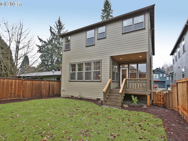 2437 North Alberta Street Portland, OR 97217 - Photo 8 of 16 a front view of a house with garden